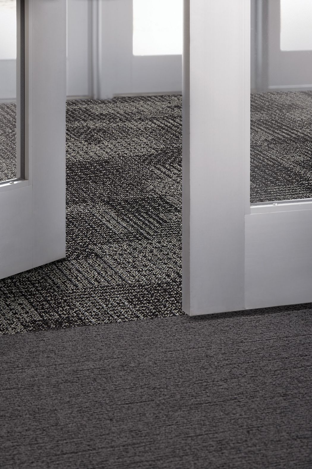Interface SR799 carpet tile and EM551 plank carpet tile in lobby area image number 5